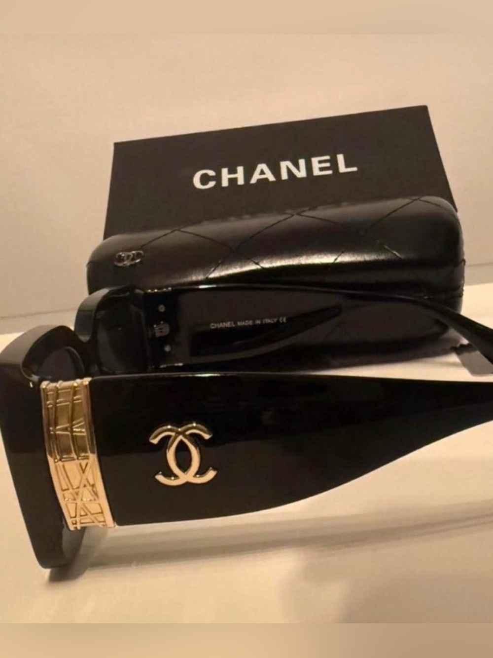 Black Sunglasses with Gold CC Emblem